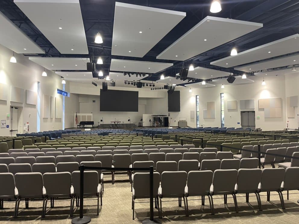 Worship centre auditorium with rows of seating cleaned and reset after a service